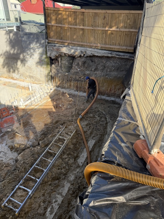 Hydro vac excavation along retaining wall tight access Sydney